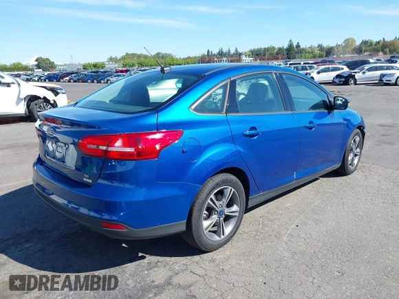 2018 Ford Focus SE z VIN 1FADP3FE4JL279265, wystawiony jako IAAI lot #42068130 z przebiegiem 43 616 mil mil oraz . Historia ofert i sprzedaży dostępna na DreamBid. Obrazek 4.