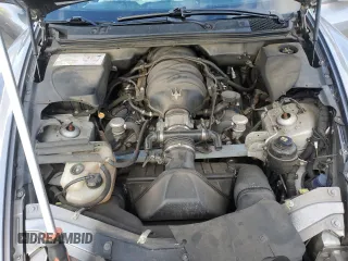 2009 Maserati Quattroporte z VIN ZAMFK39A690044644, wystawiony jako Copart lot #41343985 z przebiegiem 106 624 mil mil oraz Szkoda całkowita • Salvage title. Historia ofert i sprzedaży dostępna na DreamBid. Obrazek 11.