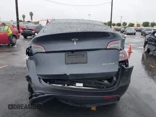 2024 Tesla Model Y Long Range with VIN 7SAYGDEE5RA241433, listed as a IAAI auction lot 41569277 with 7,490 mi miles. Bid and sale history available at carsss.com. Image 15.
