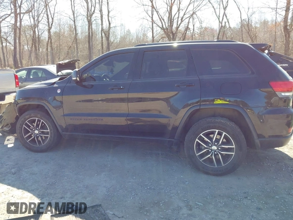 2017 Jeep Grand Cherokee Trailhawk с VIN 1C4RJFLGXHC670469, выставлен на аукционе IAAI как лот 42055116 с пробегом 99 801 миль миль и . История ставок и продаж доступна на DreamBid. Изображение 14.