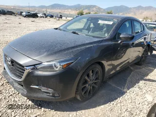 2017 Mazda 3 Grand Touring with VIN JM1BN1W32H1137559, listed as a Copart auction lot 65687494 with 116,091 mi miles and Salvage Title. Bid and sale history available at DreamBid. Image 1.