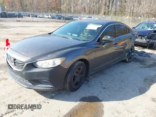 2016 Mazda 6 i Sport with VIN JM1GJ1U59G1402840, listed as a IAAI auction lot 41920724 with 147,527 mi miles and . Bid and sale history available at DreamBid. Image 17.