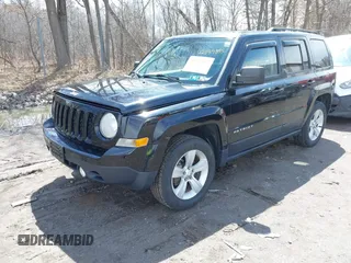 2014 Jeep Patriot Sport with VIN 1C4NJRBB1ED811019, listed as a IAAI auction lot 42181813 with 124,837 mi miles and . Bid and sale history available at DreamBid. Image 2.