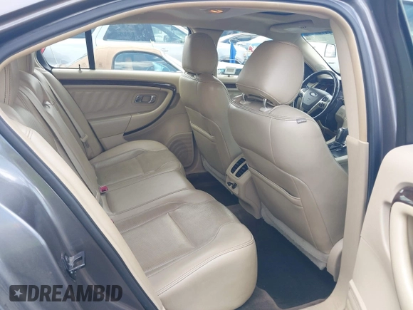 2013 Ford Taurus Limited z VIN 1FAHP2F88DG195677, wystawiony jako IAAI lot #42476918 z przebiegiem 197 732 mil mil oraz . Historia ofert i sprzedaży dostępna na DreamBid. Obrazek 8.
