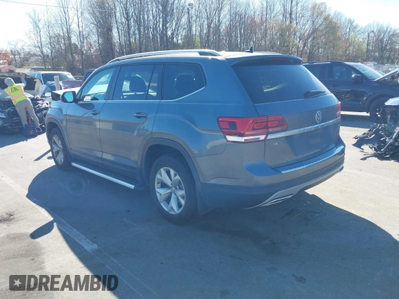 2018 Volkswagen Atlas SE with VIN 1V2CR2CA0JC571988, listed as a IAAI auction lot 41848862 with 96,426 mi miles and . Bid and sale history available at DreamBid. Image 3.