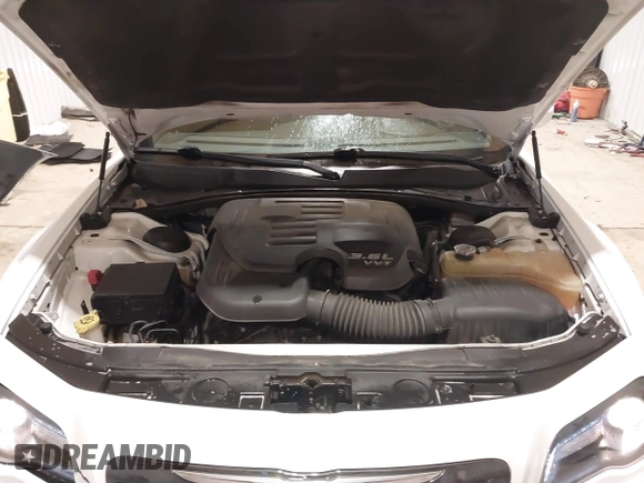 2014 Chrysler 300 with VIN 2C3CCAGGXEH384728, listed as a IAAI auction lot 41394638 with 151,362 mi miles. Bid and sale history available at carsss.com. Image 10.