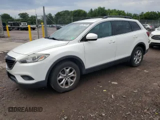 2015 Mazda CX-9 Touring with VIN JM3TB2CV2F0455488, listed as a Copart auction lot 63562195 with 139,280 mi miles and Salvage title. Bid and sale history available at DreamBid. Image 1.
