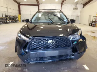 2024 Toyota Corolla Cross LE with VIN 7MUCAABG8RV113561, listed as a Copart auction lot 53343215 with 4,495 mi miles and Clean title. Bid and sale history available at DreamBid. Image 5.