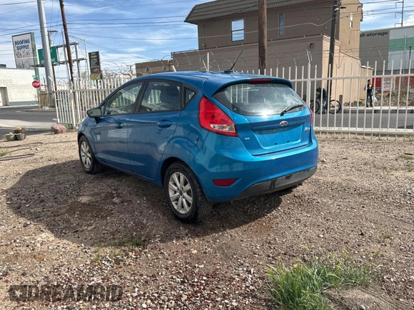 2013 Ford Fiesta SE with VIN 3FADP4EJ0DM141097, listed as a Copart auction lot 51342175 with 146,316 mi miles and Clean Title. Bid and sale history available at carsss.com. Image 3.