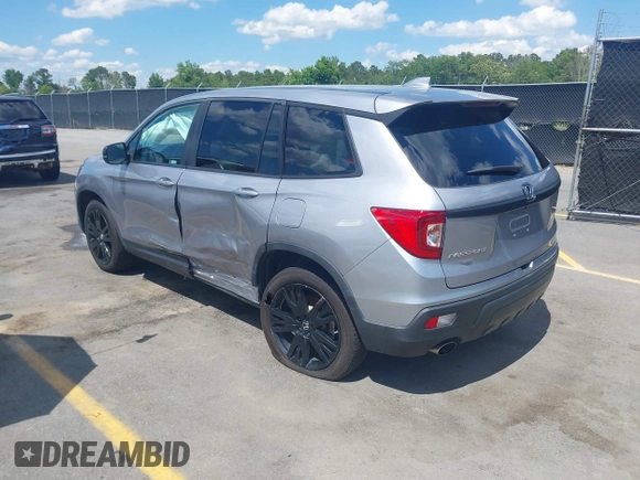 2021 Honda Passport Sport with VIN 5FNYF7H27MB003467, listed as a IAAI auction lot 42183219 with 52,156 mi miles and . Bid and sale history available at DreamBid. Image 3.