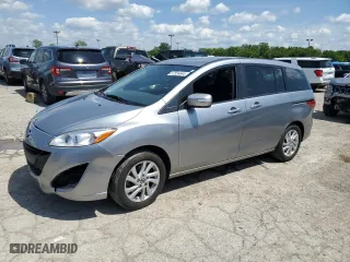 2015 Mazda Mazda5 Sport with VIN JM1CW2BL0F0189448, listed as a Copart auction lot 57324644 with 100,399 mi miles and Salvage Title. Bid and sale history available at carsss.com. Image 1.