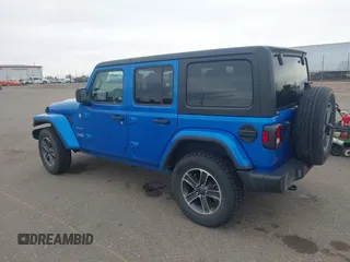 2023 Jeep Wrangler Sahara with VIN 1C4HJXEN4PW702181, listed as a IAAI auction lot 41808434 with 44,291 mi miles. Bid and sale history available at carsss.com. Image 3.