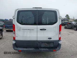 2016 Ford Transit Cargo z VIN 1FTYR1ZM3GKB36643, wystawiony jako IAAI lot #41127604 z przebiegiem 182 845 mil mil oraz . Historia ofert i sprzedaży dostępna na DreamBid. Obrazek 16.