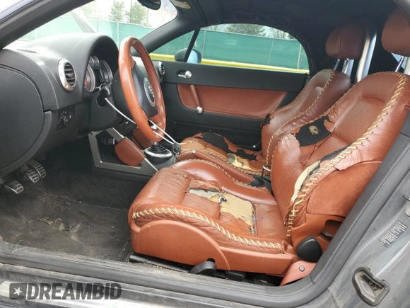 2001 Audi TT z VIN TRUTX28N511012537, wystawiony jako Copart lot #51114915 z przebiegiem 184 528 mil mil oraz Szkoda całkowita • Salvage title. Historia ofert i sprzedaży dostępna na DreamBid. Obrazek 7.