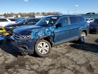 2019 Volkswagen Atlas SE with VIN 1V2LR2CA2KC604636, listed as a Copart auction lot 86716884 with 60,517 mi miles and Salvage title. Bid and sale history available at DreamBid. Image 1.