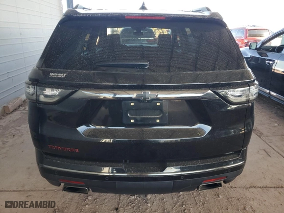 2018 Chevrolet Traverse Premier with VIN 1GNERKKW6JJ283578, listed as a Copart auction lot 48340035 with 104,124 mi miles and Salvage Title. Bid and sale history available at carsss.com. Image 6.