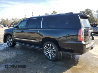 2019 GMC Yukon XL Denali with VIN 1GKS2HKJ9KR264134, listed as a Copart auction lot 43138545 with 105,690 mi miles and Salvage Title. Bid and sale history available at DreamBid. Image 2.