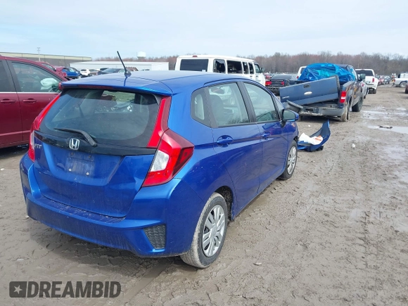 2015 Honda Fit LX with VIN 3HGGK5H52FM710434, listed as a IAAI auction lot 42022022 with 104,118 mi miles. Bid and sale history available at carsss.com. Image 4.
