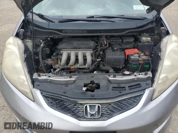 2009 Honda Fit Sport with VIN JHMGE88469S064405, listed as a Copart auction lot 61413745 with 179,497 mi miles and Salvage title. Bid and sale history available at DreamBid. Image 11.