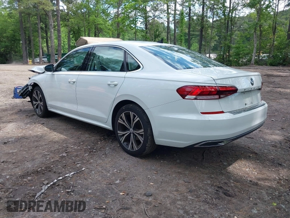 2021 Volkswagen Passat SE with VIN 1VWSA7A38MC014396, listed as a IAAI auction lot 42201818 with 62,193 mi miles and . Bid and sale history available at DreamBid. Image 3.