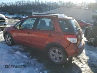 2011 Suzuki SX4 Crossover with VIN JS2YB5A38B6304623, listed as a Copart auction lot 88480495 with 92,369 mi miles and Salvage Title. Bid and sale history available at carsss.com. Image 2.