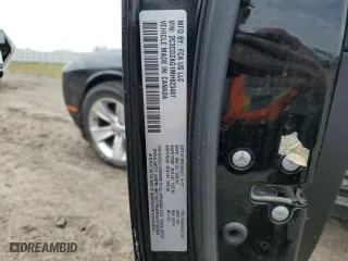 2021 Dodge Challenger SXT with VIN 2C3CDZAG1MH623487, listed as a Copart auction lot 48225645 with 77,086 mi miles and Salvage Title. Bid and sale history available at carsss.com. Image 13.