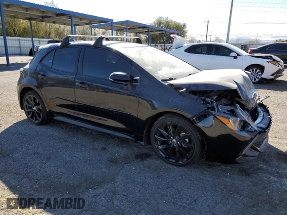 2022 Toyota Corolla Hatchback SE with VIN JTND4MBE2N3189211, listed as a Copart auction lot 49585075 with 30,486 mi miles and Salvage Title. Bid and sale history available at carsss.com. Image 4.