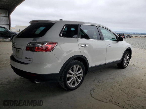 2012 Mazda CX-9 Grand Touring with VIN JM3TB3DV2C0336355, listed as a Copart auction lot 61687975 with 150,580 mi miles and Salvage title. Bid and sale history available at DreamBid. Image 3.
