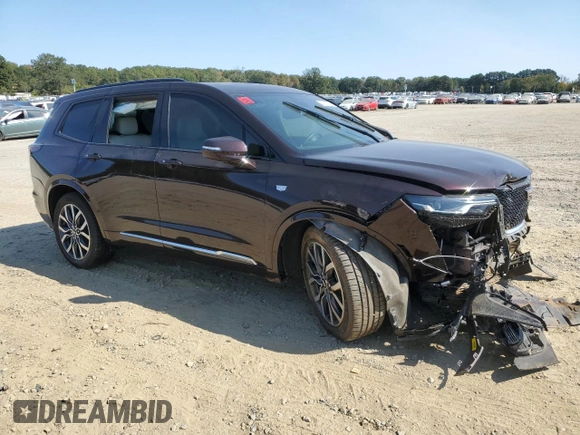 2021 Cadillac XT6 Sport with VIN 1GYKPGRS1MZ141432, listed as a Copart auction lot 75810734 with 56,925 mi miles and Salvage title. Bid and sale history available at DreamBid. Image 4.
