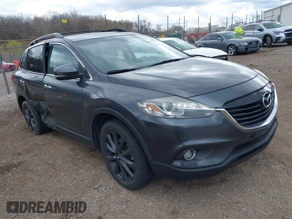 2015 Mazda CX-9 Grand Touring with VIN JM3TB3DV1F0465966, listed as a IAAI auction lot 42049749 with 74,470 mi miles and . Bid and sale history available at DreamBid. Image 1.