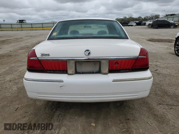 1999 Mercury Grand Marquis GS z VIN 2MEFM74W0XX670924, wystawiony jako Copart lot #51811055 z przebiegiem 176 559 mil mil oraz Szkoda całkowita • Salvage title. Historia ofert i sprzedaży dostępna na DreamBid. Obrazek 6.