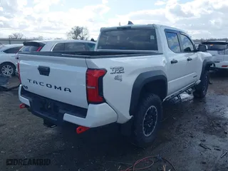 2024 Toyota Tacoma 4WD SR5 with VIN 3TYLB5JN8RT041814, listed as a IAAI auction lot 41714709 with 2,818 mi miles. Bid and sale history available at carsss.com. Image 4.