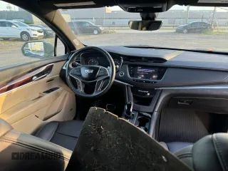 2021 Cadillac XT5 AWD Sport z VIN 1GYKNGRS9MZ200684, wystawiony jako Copart lot #78047424 z przebiegiem 2 713 mil mil oraz Czysty tytuł • Clean title. Historia ofert i sprzedaży dostępna na DreamBid. Obrazek 9.