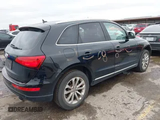 2014 Audi Q5 Premium Plus with VIN WA1LFAFP0EA041939, listed as a IAAI auction lot 41573437 with 160,307 mi miles. Bid and sale history available at carsss.com. Image 4.