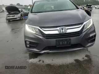 2018 Honda Odyssey EX with VIN 5FNRL6H50JB047999, listed as a Copart auction lot 57819495 with 121,295 mi miles and Salvage title. Bid and sale history available at DreamBid. Image 14.