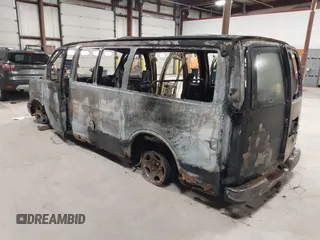 2005 Chevrolet Express Passenger with VIN 1GNFG15T751202874, listed as a IAAI auction lot 42312263 with Not provided miles and . Bid and sale history available at DreamBid. Image 3.