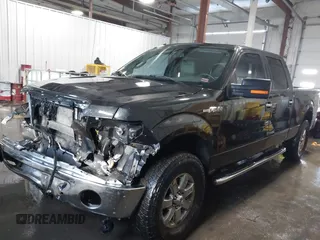 2014 Ford F-150 XL with VIN 1FTFW1EF9EKF23024, listed as a IAAI auction lot 41286621 with 201,444 mi miles. Bid and sale history available at carsss.com. Image 2.