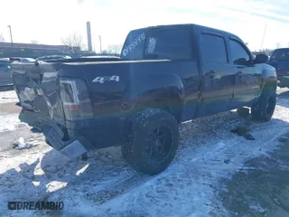 2013 GMC Sierra 1500 SLT with VIN 3GTP2WE79DG377543, listed as a IAAI auction lot 41407899 with 101,827 mi miles. Bid and sale history available at carsss.com. Image 4.