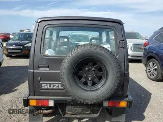 1986 Suzuki Samurai z VIN JS3JC51V8G4110639, wystawiony jako Copart lot #75466894 z przebiegiem Nie podano mil oraz Szkody całkowita. Historia ofert i sprzedaży dostępna na DreamBid. Obrazek 6.