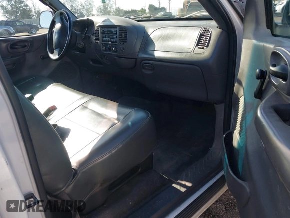2002 Ford F-150 XL with VIN 1FTRF17232NB82575, listed as a IAAI auction lot 42276991 with 170,668 mi miles and . Bid and sale history available at DreamBid. Image 5.