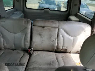 2002 GMC Yukon SLT z VIN 1GKEC13Z42J333817, wystawiony jako Copart lot #54819725 z przebiegiem 302 313 mil mil oraz Szkoda całkowita • Salvage title. Historia ofert i sprzedaży dostępna na DreamBid. Obrazek 10.