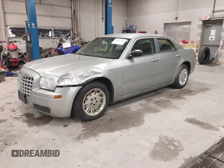 2005 Chrysler 300 with VIN 2C3JA43R55H569369, listed as a IAAI auction lot 41132751 with 123,253 mi miles. Bid and sale history available at carsss.com. Image 2.