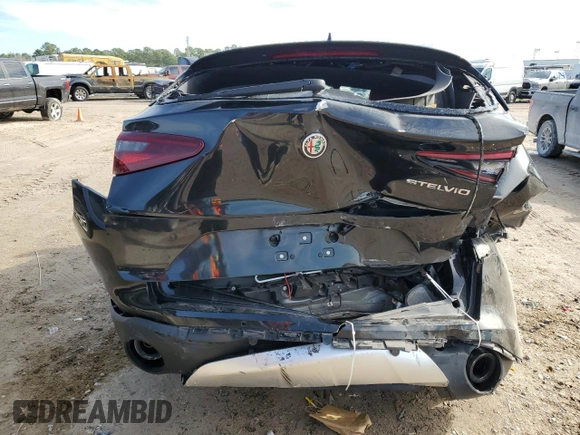 2019 Alfa Romeo Stelvio z VIN ZASPAJAN0K7C36435, wystawiony jako Copart lot #88057385 z przebiegiem Nie podano mil oraz Szkoda całkowita • Salvage title. Historia ofert i sprzedaży dostępna na DreamBid. Obrazek 6.