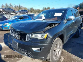 2021 Jeep Grand Cherokee Overland with VIN 1C4RJFCG3MC601150, listed as a IAAI auction lot 41421403 with 165,614 mi miles and . Bid and sale history available at DreamBid. Image 6.