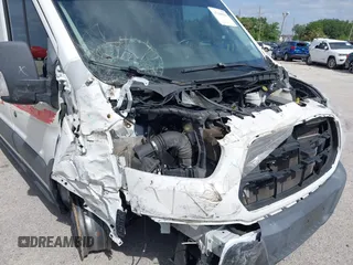 2017 Ford Transit z VIN 1FTYE2CG6HKB46718, wystawiony jako IAAI lot #37349829 z przebiegiem 94 836 mil mil oraz . Historia ofert i sprzedaży dostępna na DreamBid. Obrazek 6.