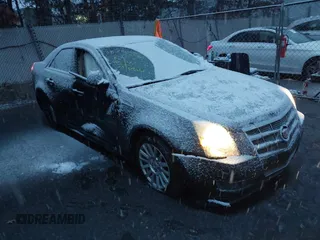 2010 Cadillac CTS Luxury with VIN 1G6DE5EG6A0138880, listed as a IAAI auction lot 38730528 with 217,664 mi miles and . Bid and sale history available at DreamBid. Image 1.