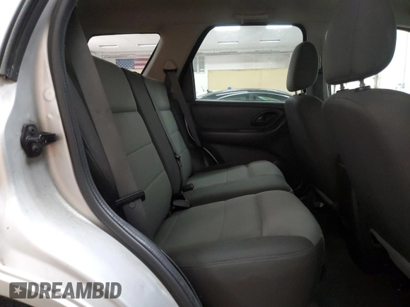 2005 Ford Escape XLS Value z VIN 1FMYU02Z55KA45705, wystawiony jako Copart lot #57244345 z przebiegiem Nie podano mil oraz Czysty tytuł • Clean title. Historia ofert i sprzedaży dostępna na DreamBid. Obrazek 11.
