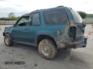 1998 Ford Explorer Sport with VIN 1FMYU22X7WUB73136, listed as a Copart auction lot 54338255 with 197,323 mi miles and Salvage title. Bid and sale history available at DreamBid. Image 2.