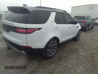 2018 Land Rover Discovery HSE Luxury z VIN SALRT2RV3JA057709, wystawiony jako IAAI lot #41563821 z przebiegiem 99 639 mil mil oraz . Historia ofert i sprzedaży dostępna na DreamBid. Obrazek 4.