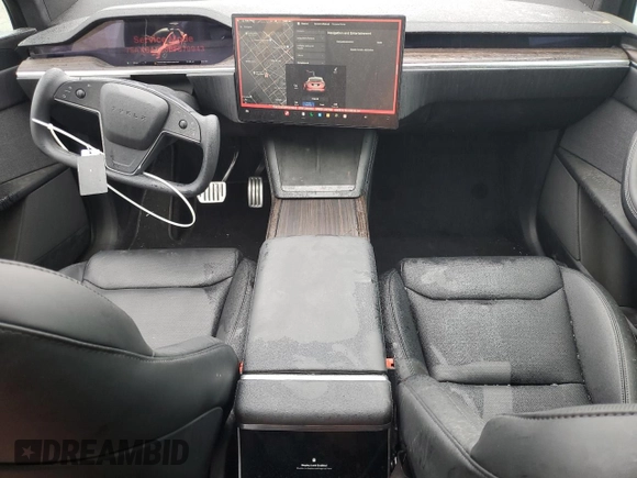 2023 Tesla Model X with VIN 7SAXCAE58PF379943, listed as a Copart auction lot 86352354 with Not Provided miles and Salvage Title. Bid and sale history available at DreamBid. Image 8.